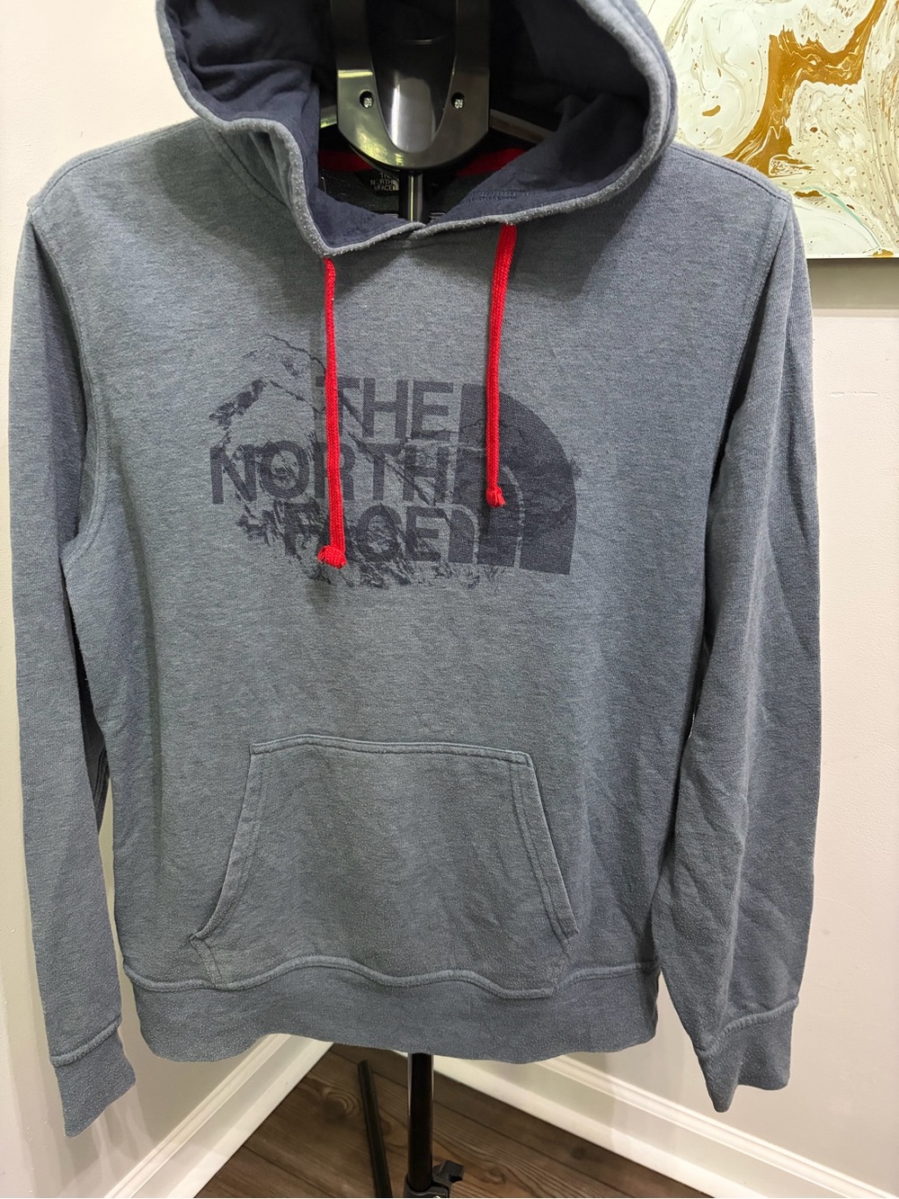 The North Face Men’s Gray Pullover Hoodie with Red Drawstrings